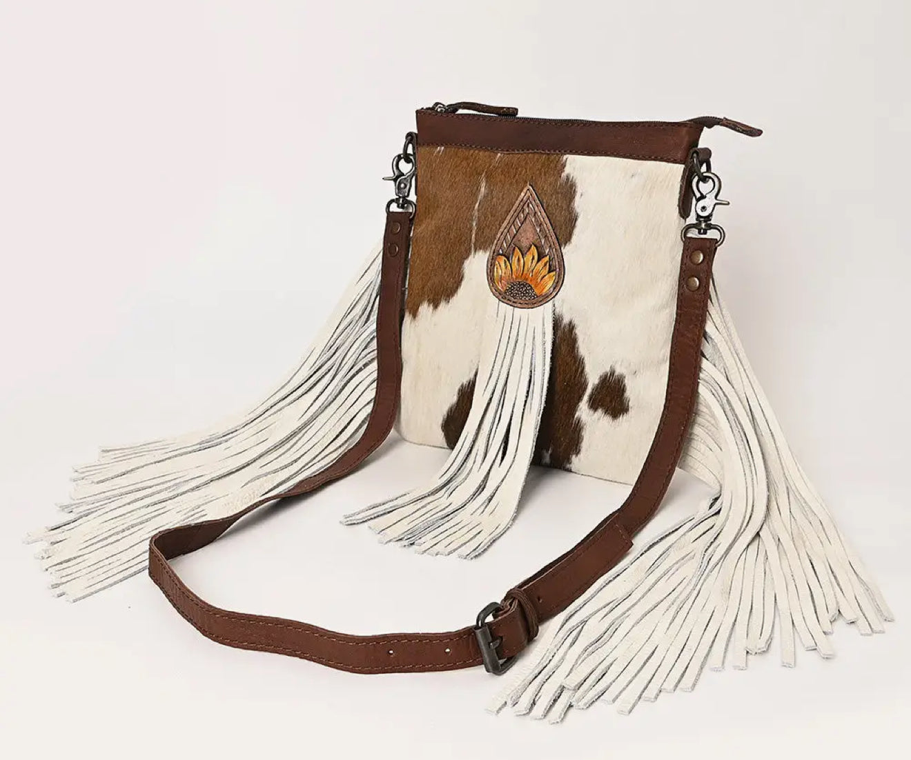 Cowhide and leather tassel’s