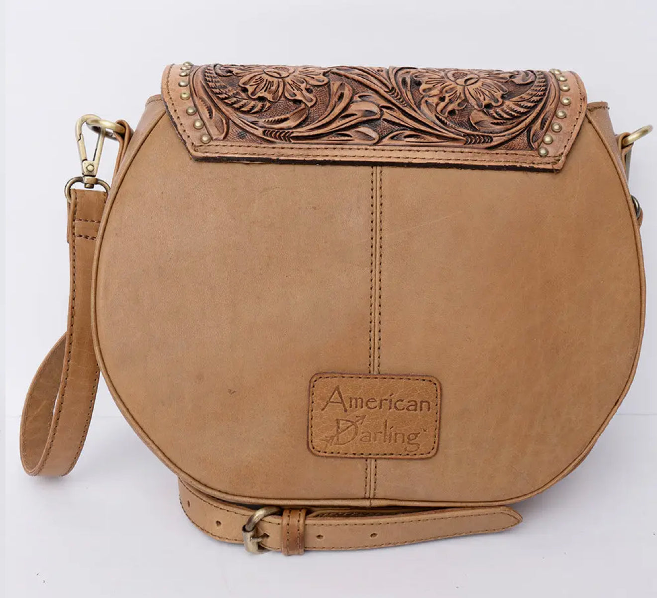 Crossbody leather tooled bag