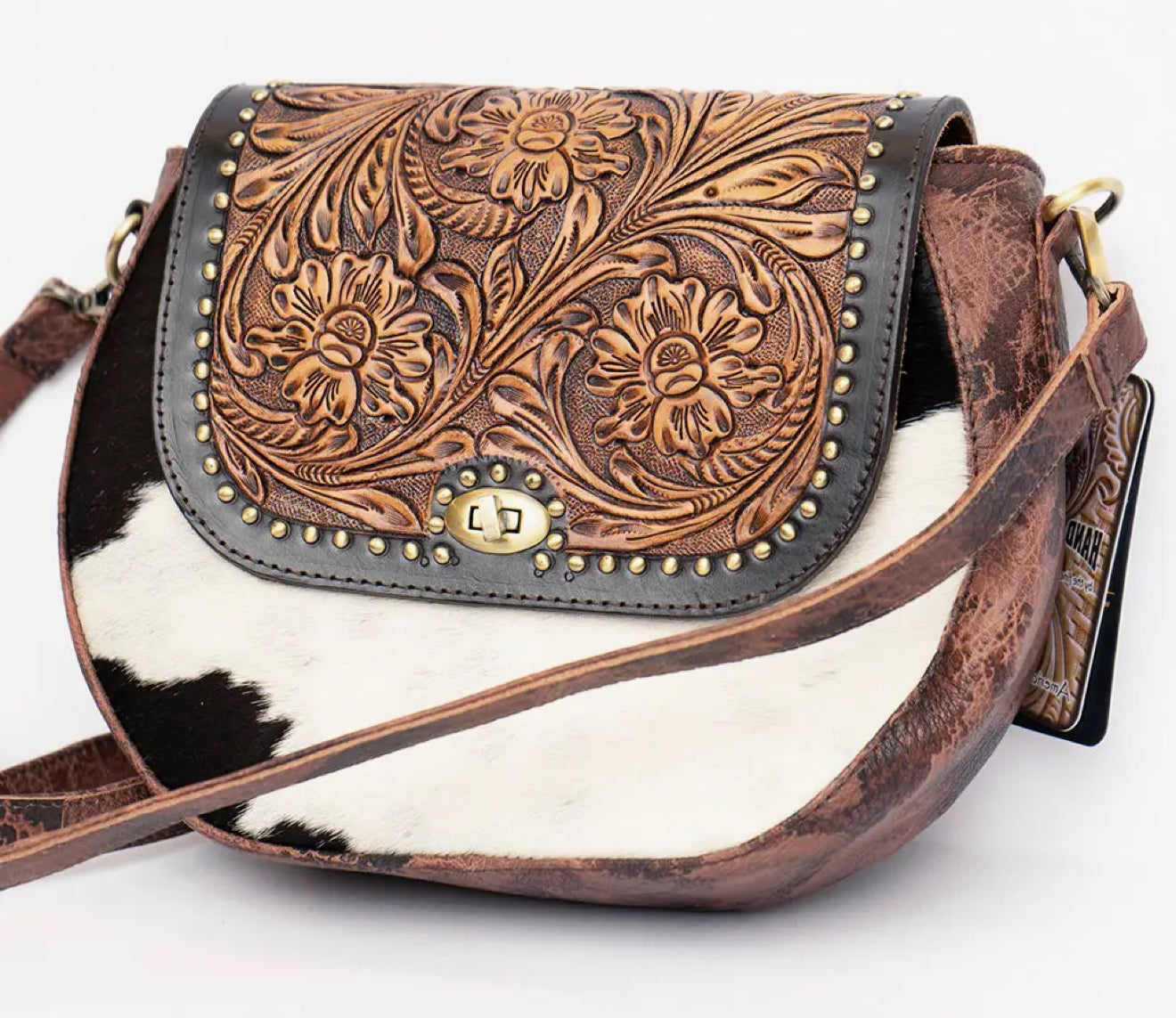 Crossbody leather tooled bag