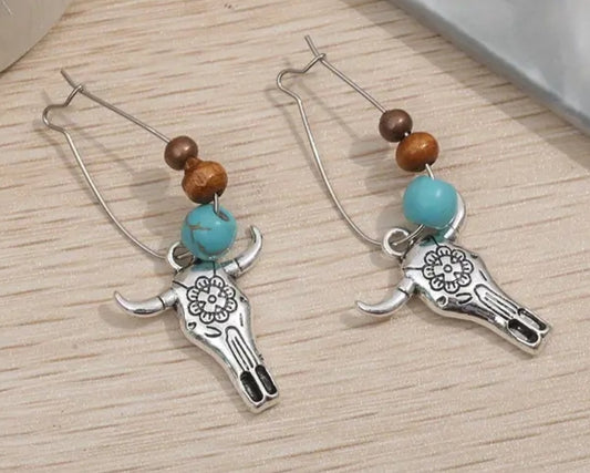 Cow head dangle earrings