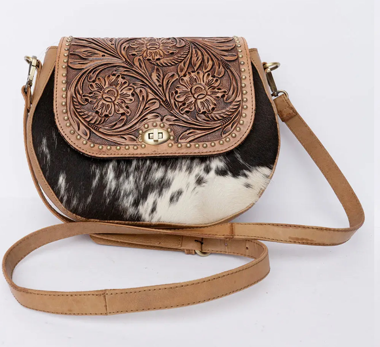 Crossbody leather tooled bag